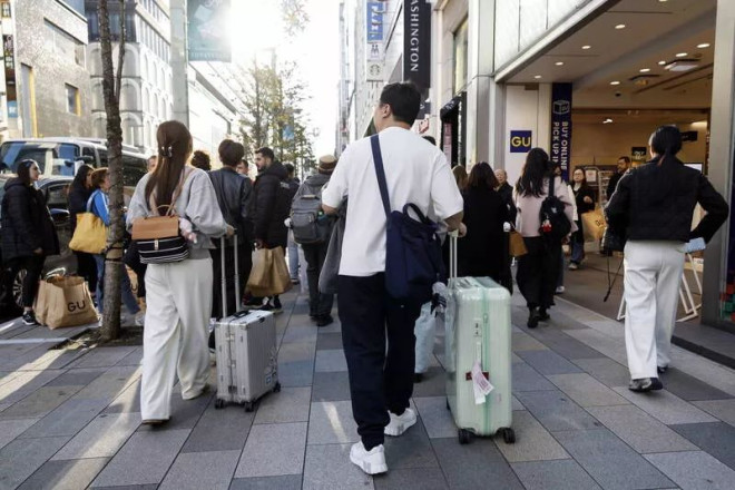 中国央企员工赴日旅游打卡 遭同事举报惨了