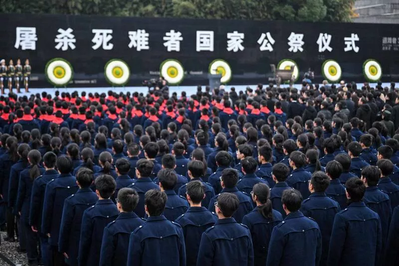 中国纪念南京大屠杀意外低调 军方则发“大刀祭”